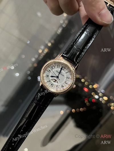 High Quality Replica JAEGER-LECOULTRE Rendez-Vous Collection Black Leather Strap White Face Dial White Diamonds Bezel Watch 33mm
